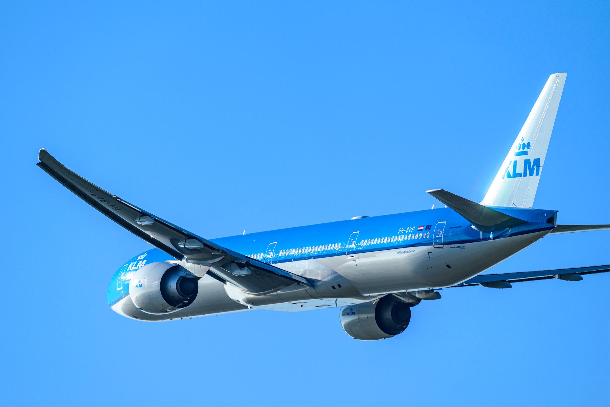 Boeing 777-206 of KLM Royal Dutch Airlines taking off from Schiphol Amsterdam Airport at the Kaagbaan runway.