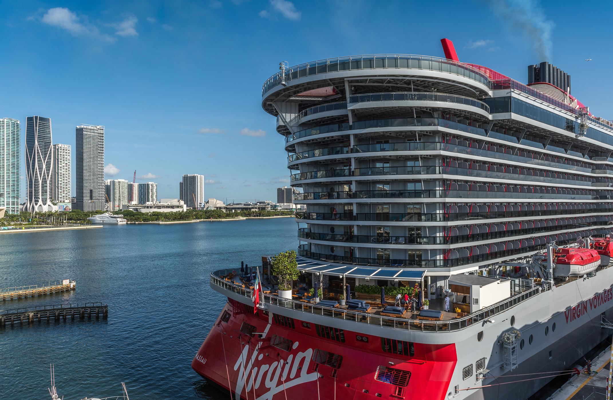 View of the beautiful cruise ship Scarlet Lady, of the Virgin Voyages company in the preparation process, at the cruise terminal, of the commercial port of Miami. Virgin Voyages is a cruise line headquartered in Plantation, Florida, with two fleet ships.