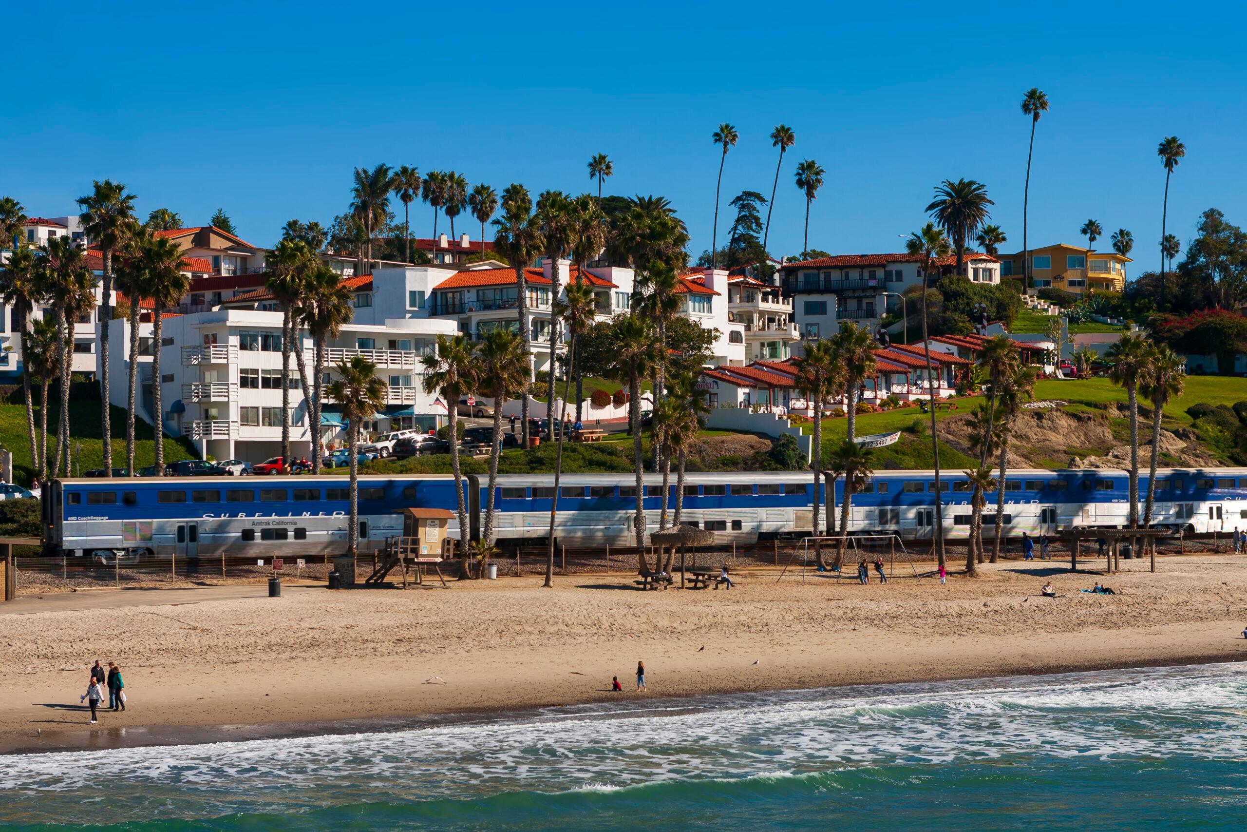Amtrak's Pacific Surfliner, traveling south on the west coast through San Clemente, Southern California, on a cloudless, winter day.