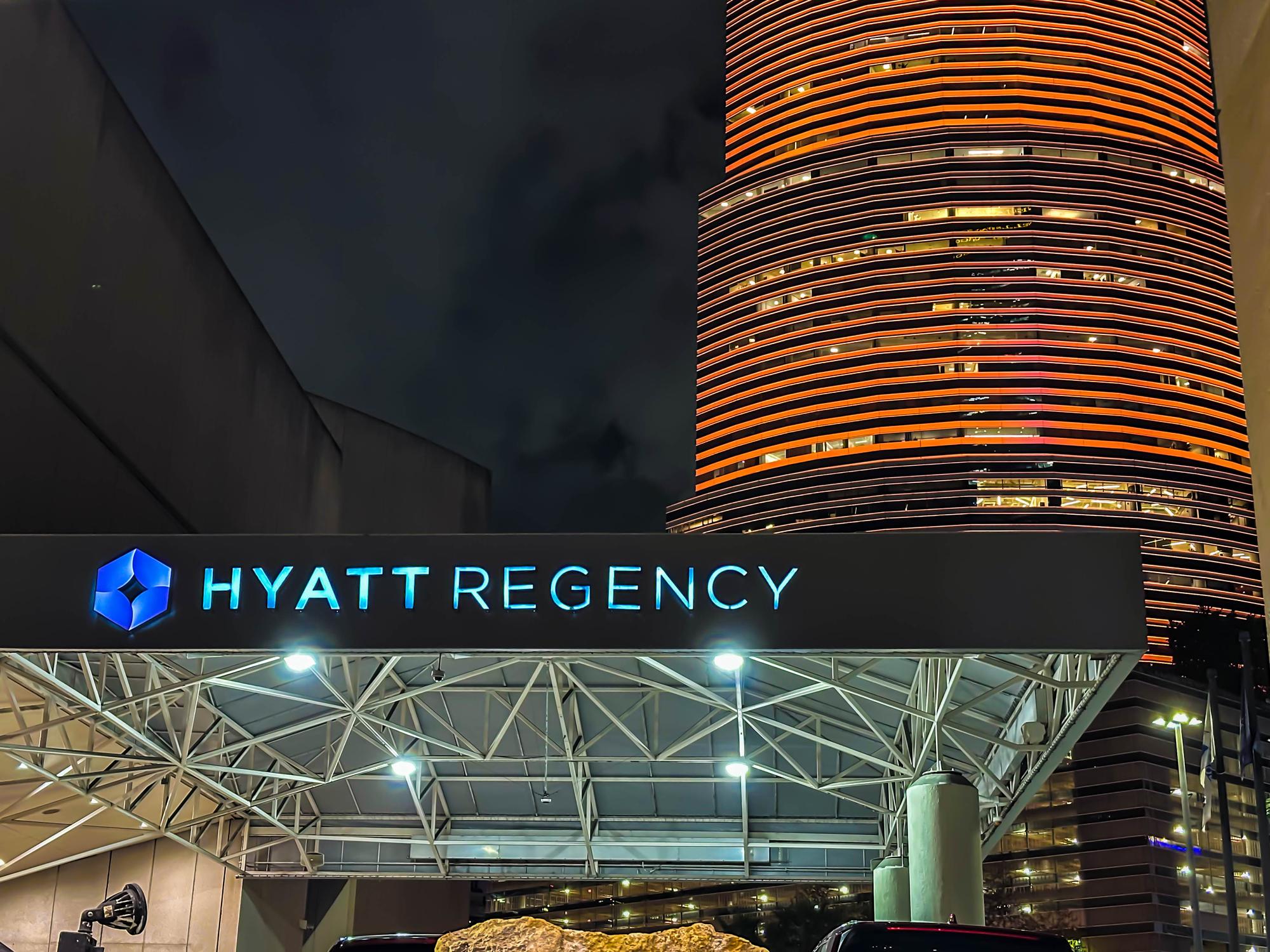 Hyatt Regency hotel and City National Bank of Florida in the backgeound at night