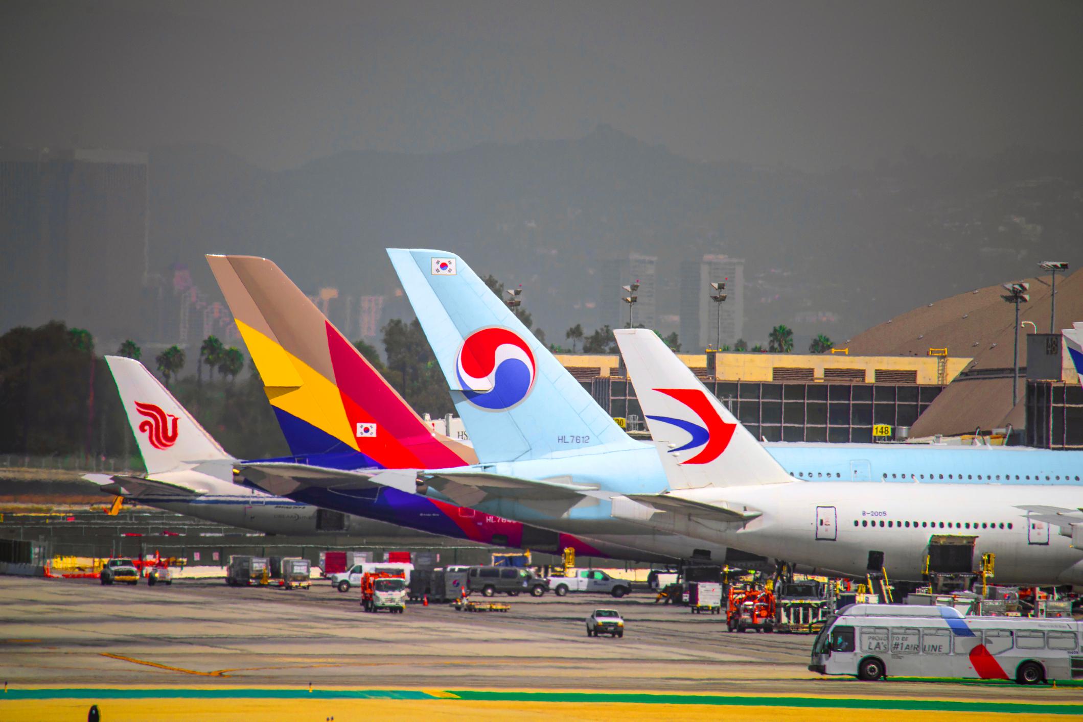 Los Angeles, United States - November 11, 2017: Korean Air and Asiana Airlines flights at Los Angeles terminal. Two major international airlines out of South korea flies daily out of Los Angels airport. Los Angeles airport, LAX, is the busiest airport in the western USA. Also Los Angeles has the most korean population outside of Korea.