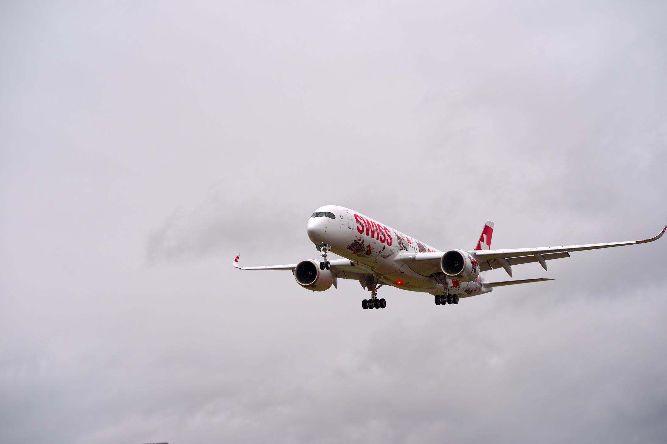 Swiss passenger airplane Airbus A350-900 registration HB-IFA landing at Swiss Zurich Airport after a go-around on a cloudy windy autumn day. Photo taken October 25th, 2025, Zurich Kloten, Switzerland.
